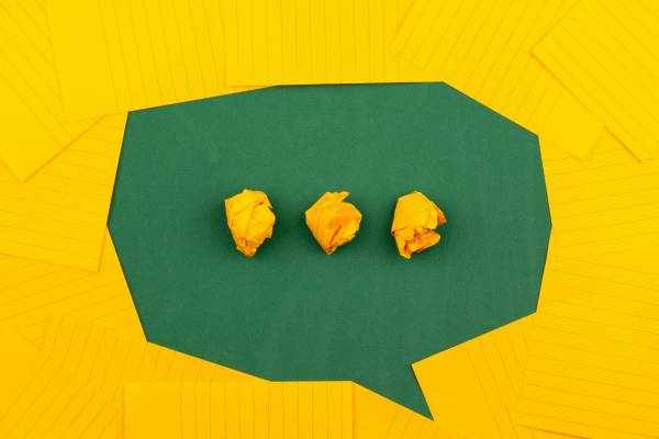 Speech bubble made from yellow and green paper