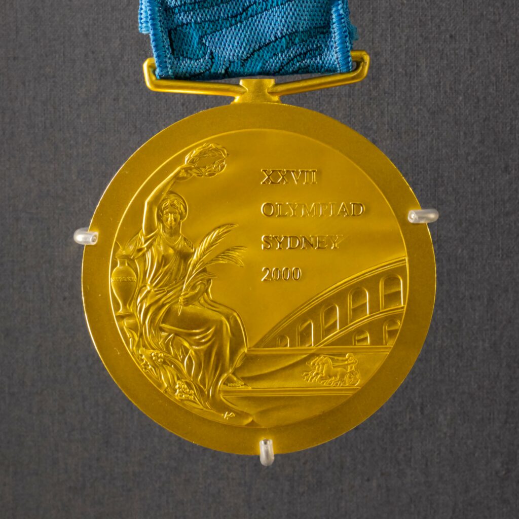 An Olympic gold medal 
Photo by Aditya Joshi on Unsplash